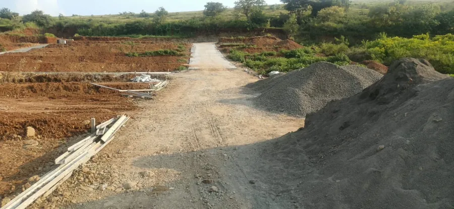 Internal road under construction with materials on site