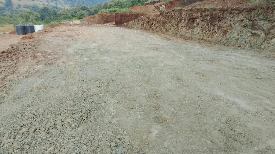 Levelled and compacted plot surface